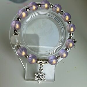 Purple double charm glass bead bracelet